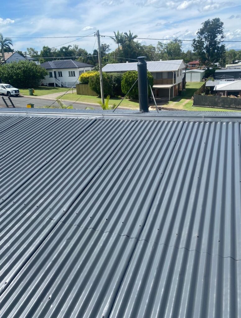 New painted metal roof after a complete roof restoration